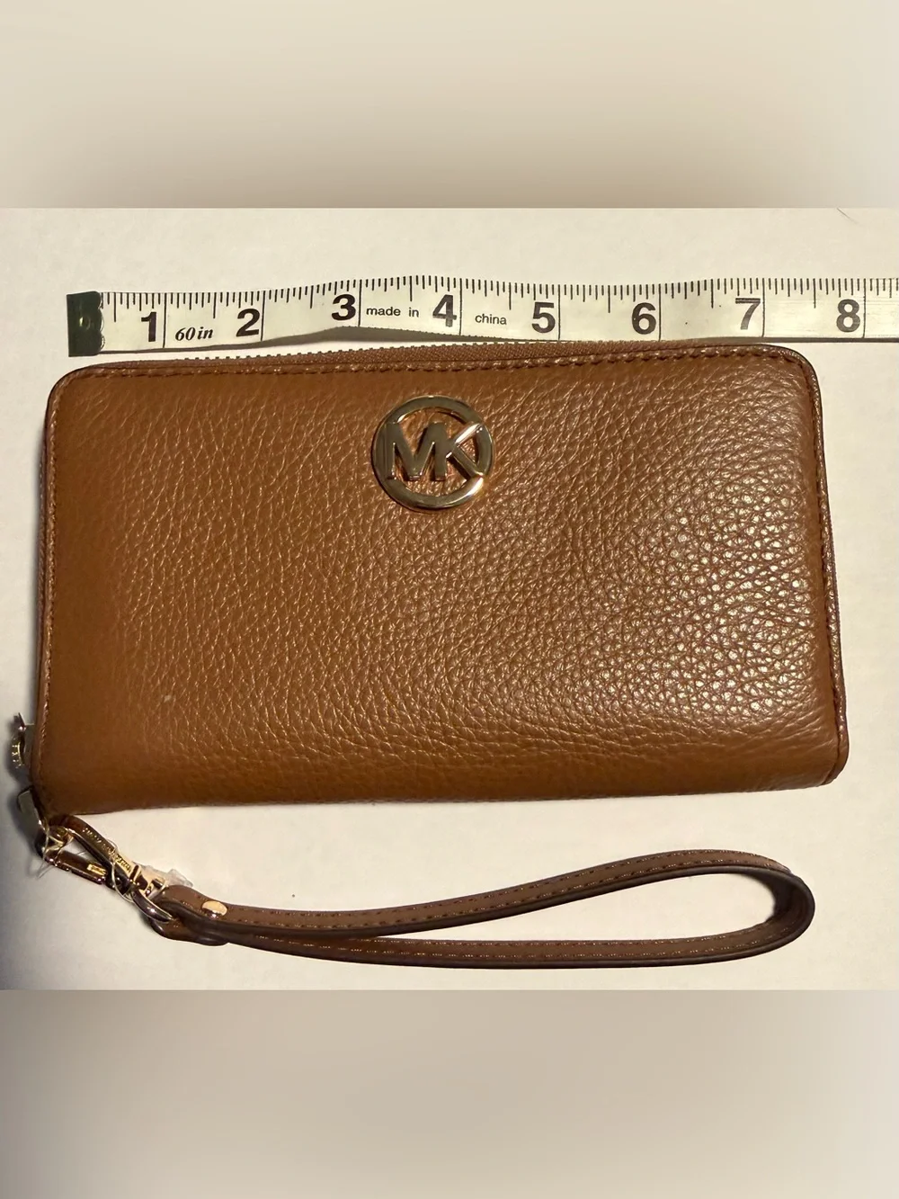 Michael Kors Tan Pebbled Leather Wristlet with Gold Logo